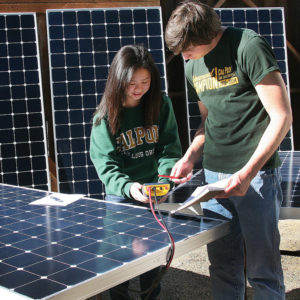 Students working on solar panel
